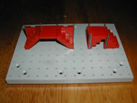 The original parts, left and right steps and platform, on the left and straight steps on the right